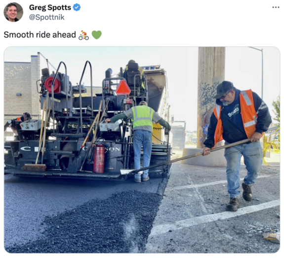 Screenshot of tweet by SDOT Director Greg Spotts with a photo of workers using a large paving machine with smooth asphalt behind it. Text says Smooth ride ahead.